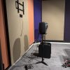 Colored acoustic panels on walls of a production studio room