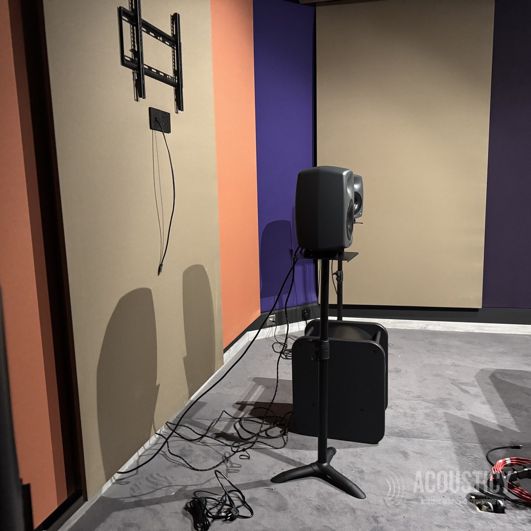 Colored acoustic panels on walls of a production studio room
