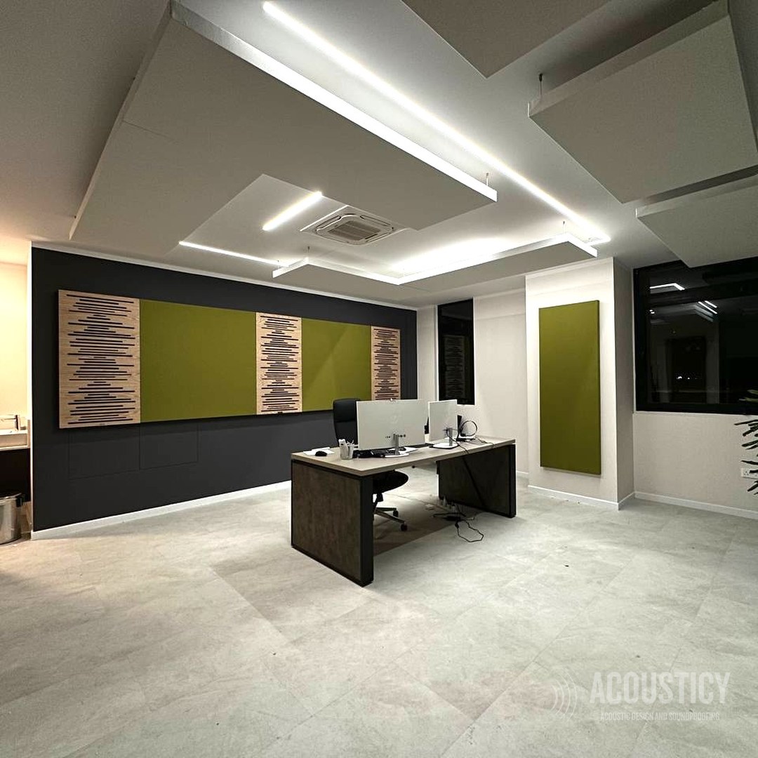 Green and textured acoustic wall panels in a private office